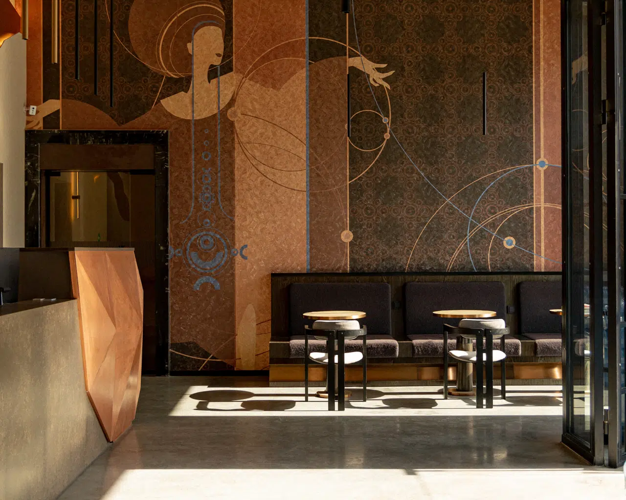 Reception and wall artwork at Rilas Hotel & Spa